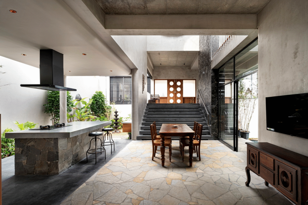 Compact home interior with dining and kitchen by Kalyan architecture firms for small homes