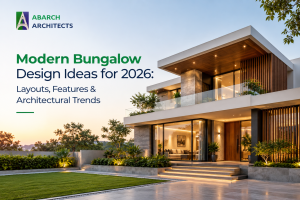 Modern bungalow at dusk with wooden louvred facade, glass balcony, illuminated landscaping and covered entrance